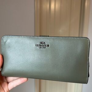 Dark green coach wallet